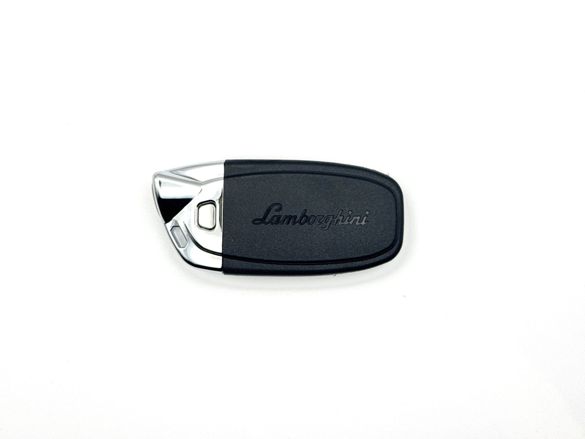 Lamborghini key fob on a white background front on