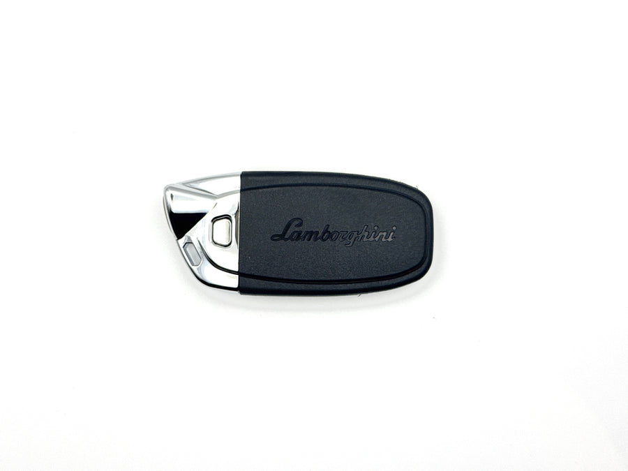 Lamborghini key fob on a white background front on